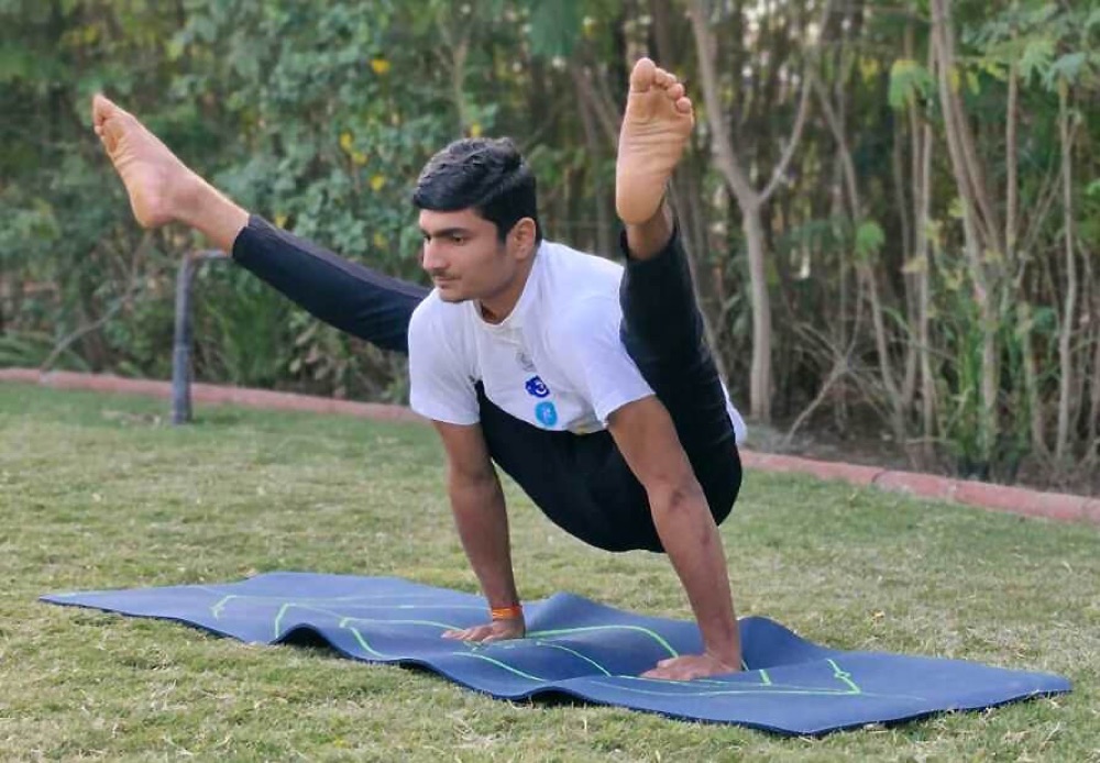 Firefly Pose (Tittibhasana) yoga pose